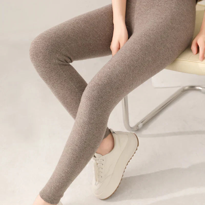 Women's high waist cashmere leggings in a soft fine knit, perfect for winter warmth & style.