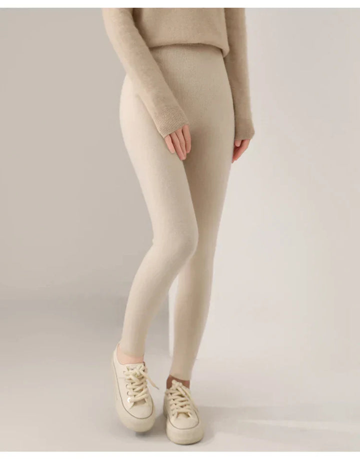 Flattering high-waist women's leggings, soft cashmere knit for comfort and autumn fashion.