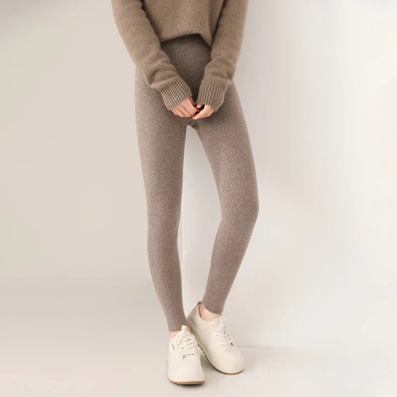 Soft women's high-waist cashmere leggings, ideal for warmth and comfort in cool weather.