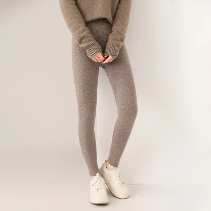 Soft women's high-waist cashmere leggings, ideal for warmth and comfort in cool weather.
