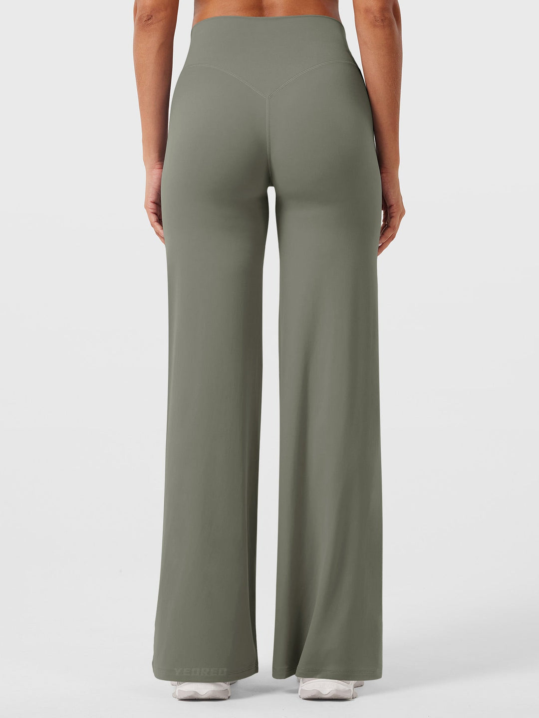 Woman wearing high waist flared pants, summer casual, comfortable versatile fashion
