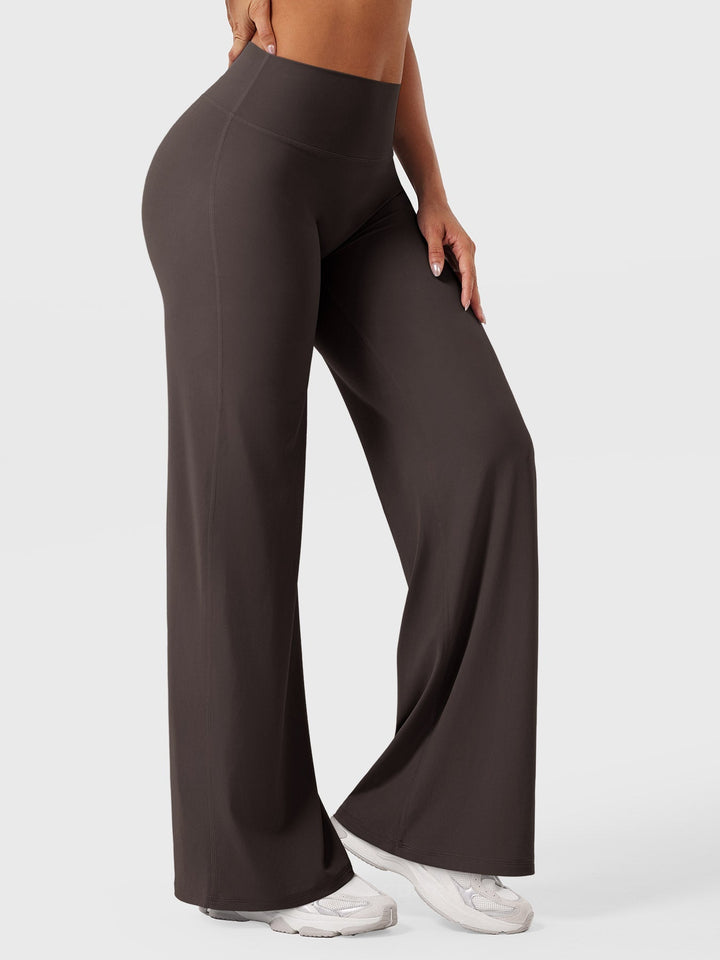 Women's high waist flared pants, styled with a crop top, summer casual, comfortable versatile