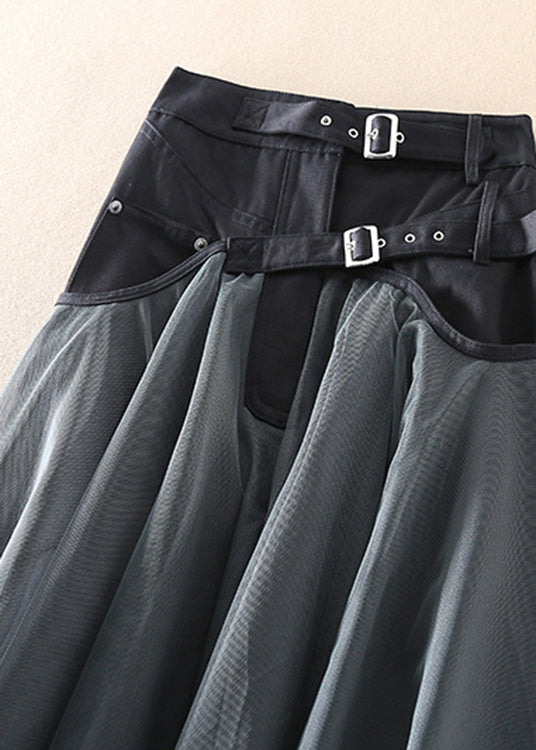 Model wearing elegant women's high waist flowy long skirt, perfect formal evening wear chic look.