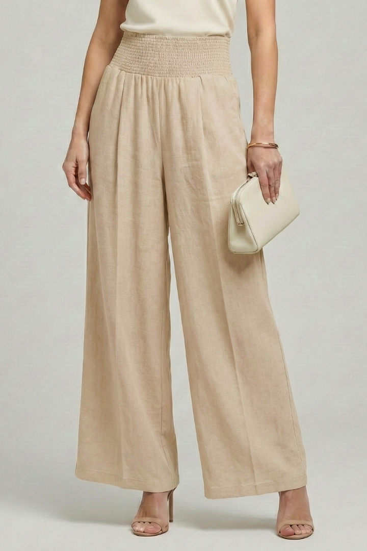 Elegant women's pleated palazzo pants with a high waist, ideal for comfortable and stylish summer fashion.