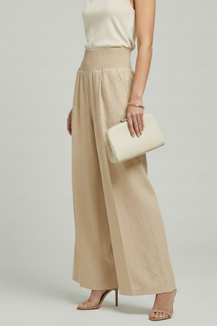 Casual yet chic women's wide-leg palazzo trousers, high-waisted and pleated for a flowy summer look.