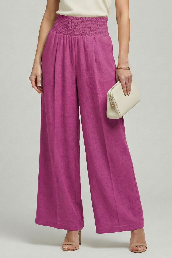 Women's summer fashion: high waist pleated palazzo trousers, perfect for a relaxed yet elegant wide-leg ensemble.
