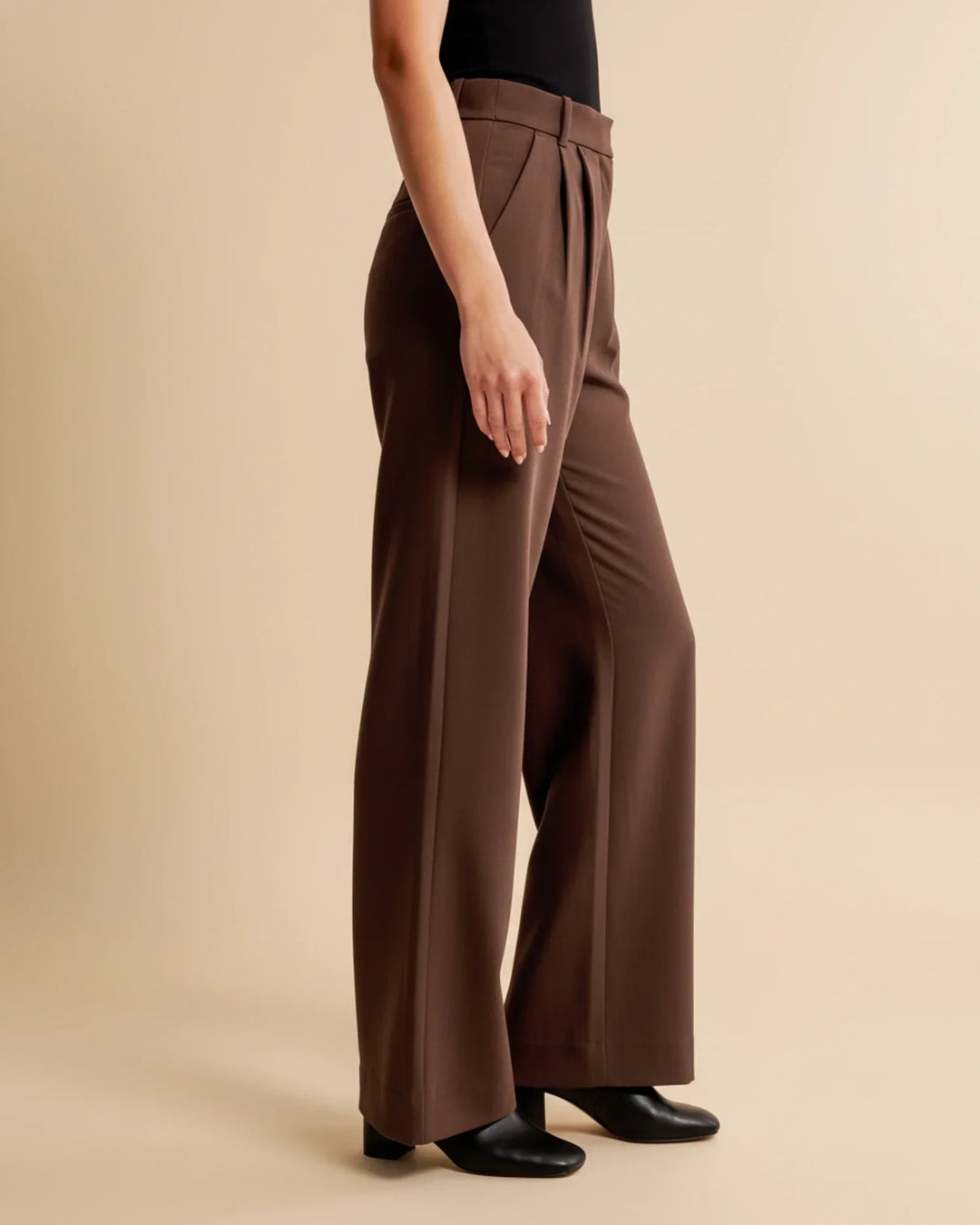 Women's comfortable high waist pleated tailored trousers, designed for a modest and chic look.