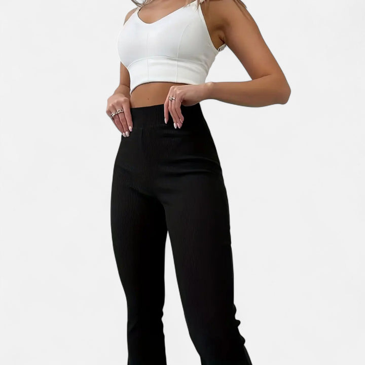 Chic women's high-waist ribbed slim fit leggings, ideal for versatile fashion & effortless style.