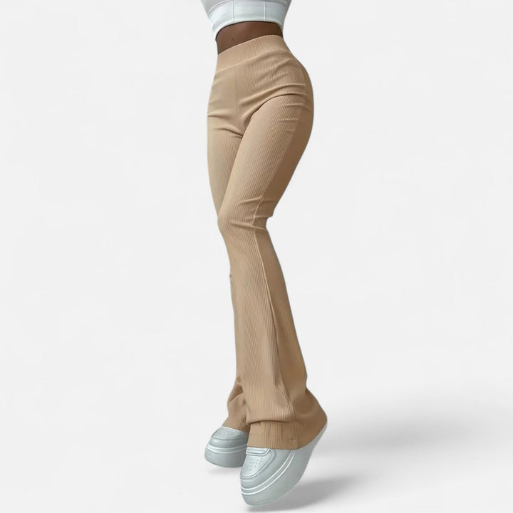 Comfortable women's high-waist ribbed leggings, offering a slim leg & chic look for any occasion.