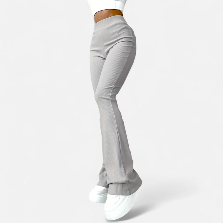 Women's high-waist ribbed slim fit leggings. Versatile, comfortable, and chic for modern everyday fashion.