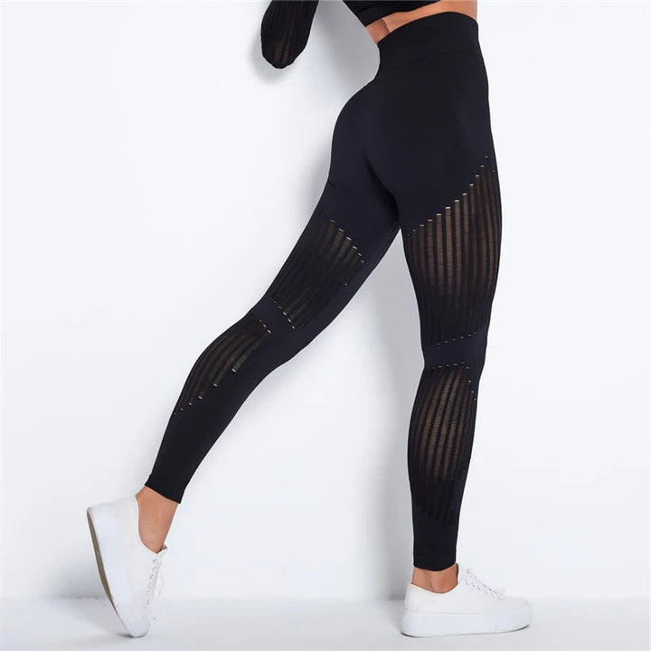 Model wearing women's high-waist seamless sculpting athletic leggings, accentuating activewear and stretchy design.
