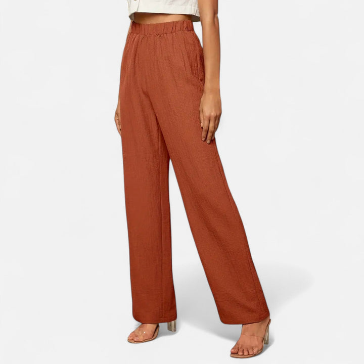 Women's high-waist straight-leg trousers for a classic, elegant and timeless style.