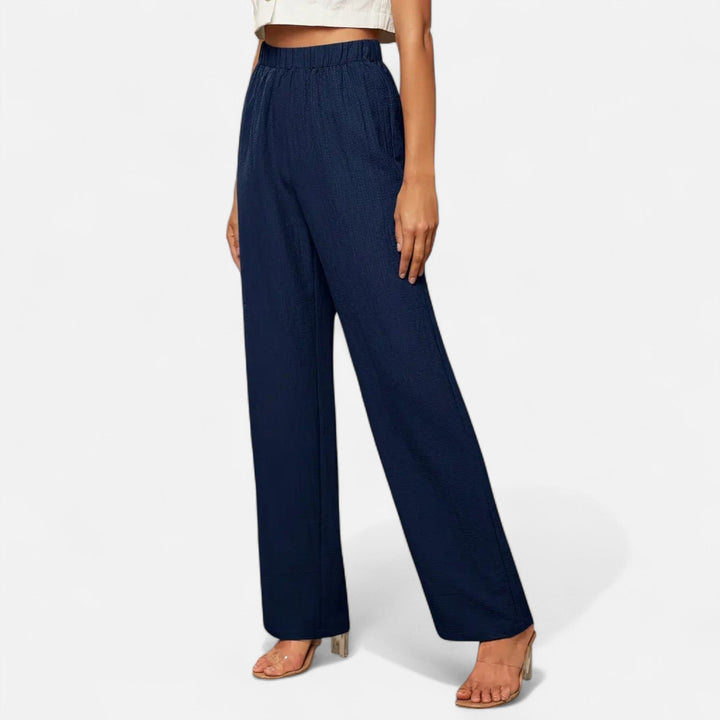 Elegant women's high-waist straight-leg trousers in a timeless classic style for office or daily wear.