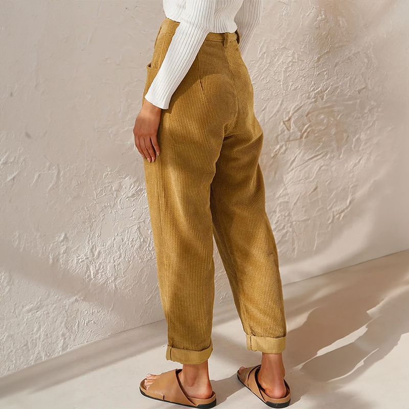 Fashionable women's high waist flowy wide leg pants in a light, comfortable fabric.