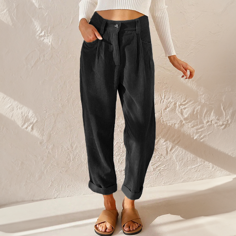 Comfortable women's black wide leg flowy pants, featuring a flattering high waist.