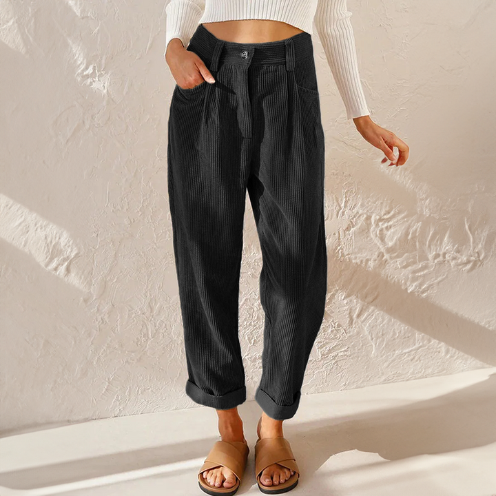 Comfortable women's black wide leg flowy pants, featuring a flattering high waist.