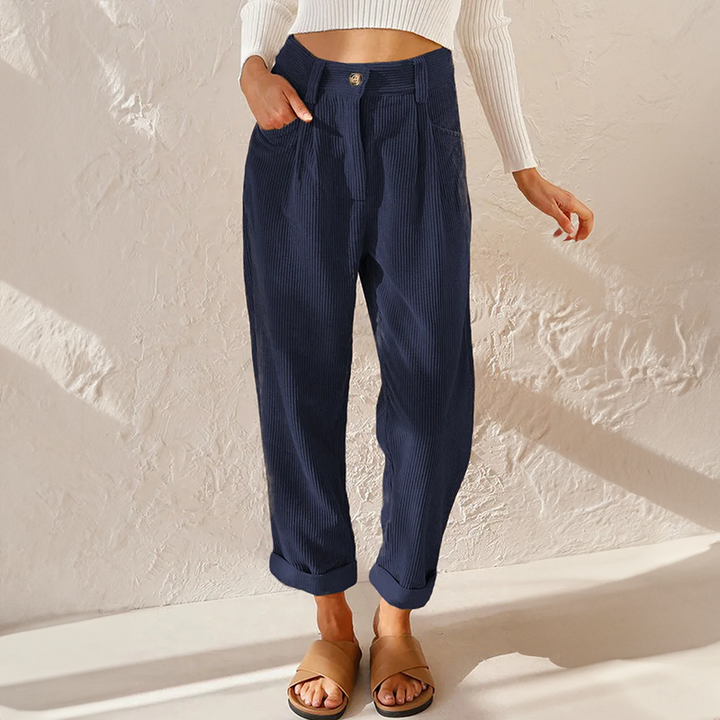 Elegant women's flowy wide leg pants with a high waist, suitable for casual wear.