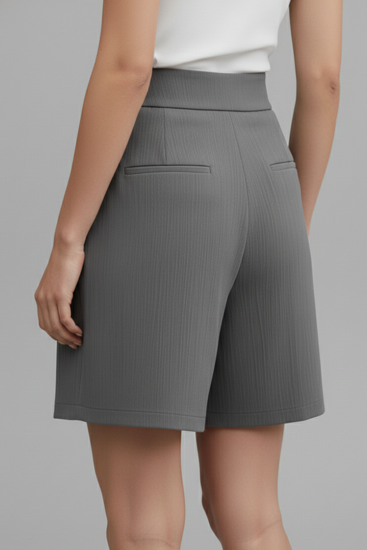 Solid color high waist shorts for women with a trendy wide leg, offering comfort and style.