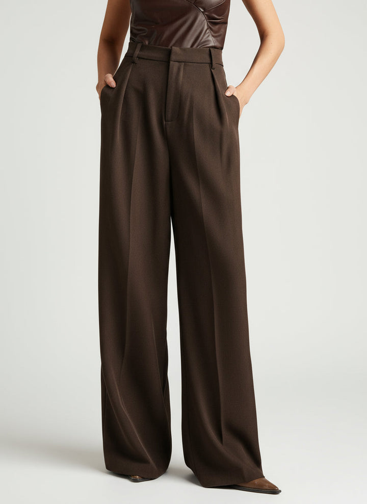 High quality women's high waist wide leg tailored trousers, ideal for business and formal events.
