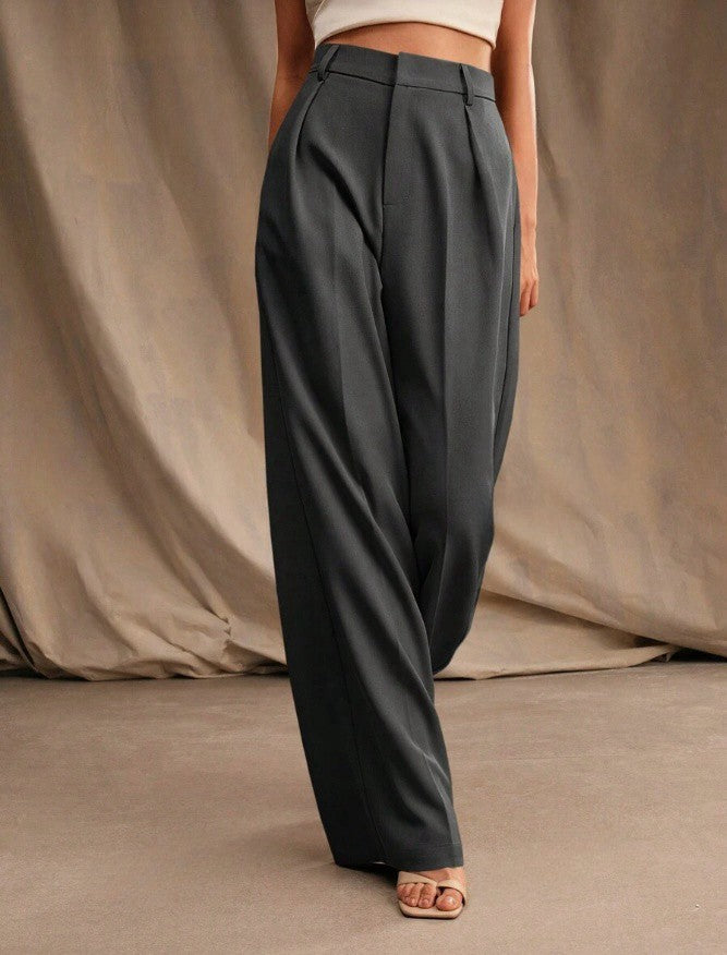 Chic women's wide leg pants with a flattering high waist and tailored finish. Versatile smart casual wear.