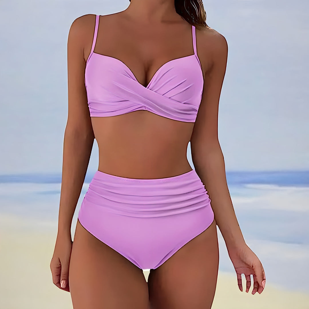 Summer fashion: women's high-waisted bikini set with a supportive twist-front top and flattering design.