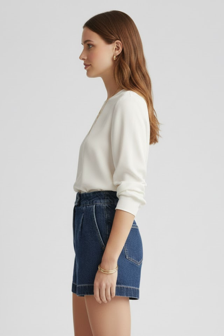 Casual women's high waisted blue denim shorts with a classic rolled hem for everyday wear.