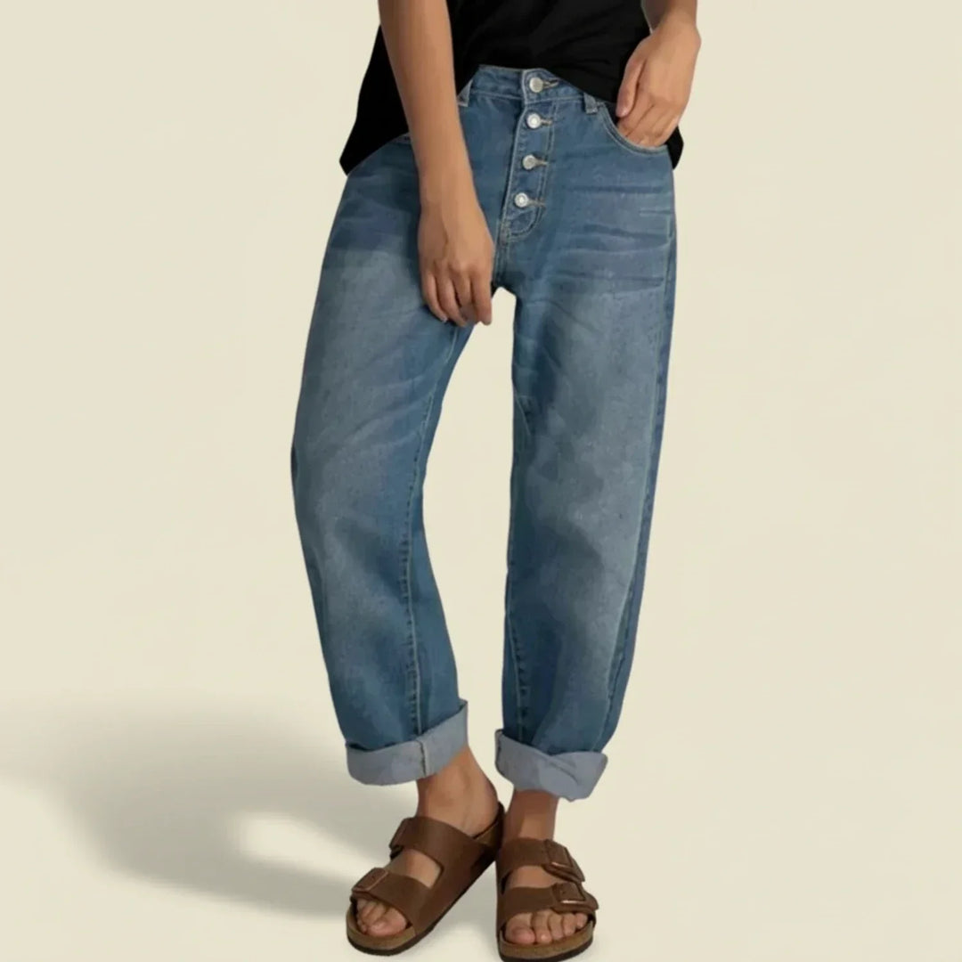 Women's high-waisted, straight-fit blue denim jeans with a button fly, perfect for casual summer fashion.