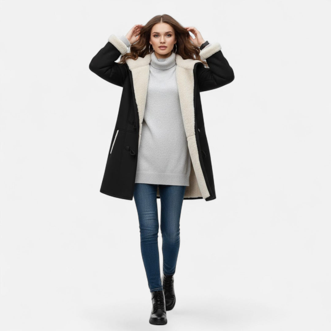 Classic women's hooded button-front winter coat, combining elegance with cold-weather warmth.