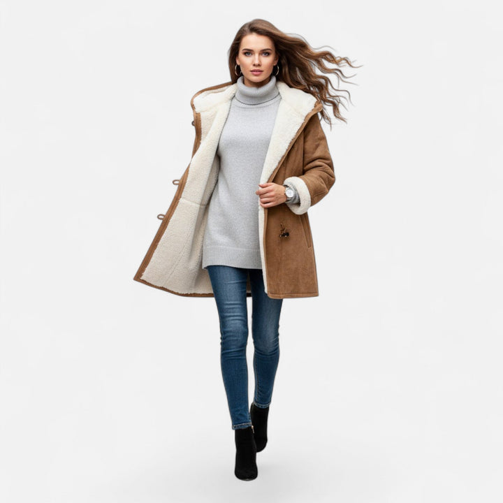 Essential women's hooded winter coat, button-front and warm, a staple for cold-weather fashion.