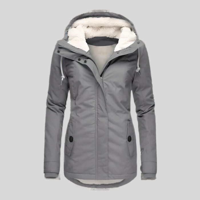Women's hooded lightweight waterproof rain jacket in blue, perfect for all-weather outdoor activities.