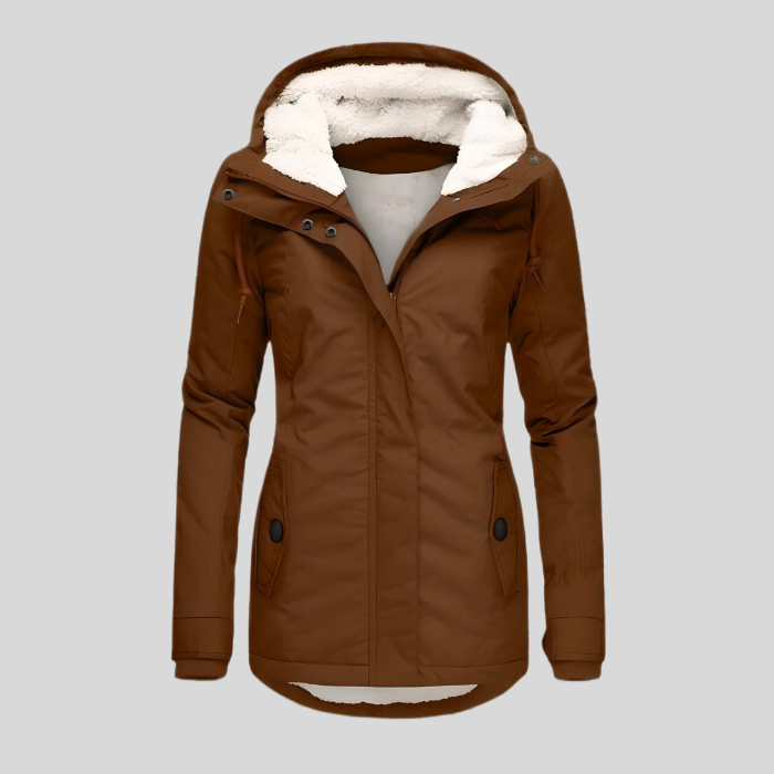 Close-up of a women's rain jacket fabric, highlighting its waterproof and durable qualities.