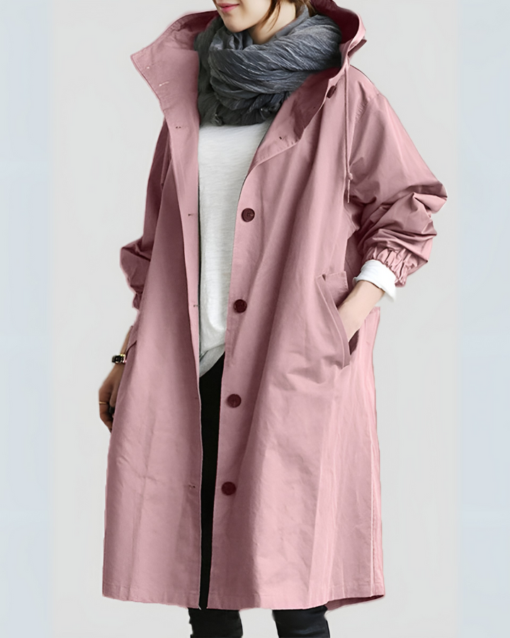 Side view of women's loose fit hooded trench coat, showcasing its comfortable design.