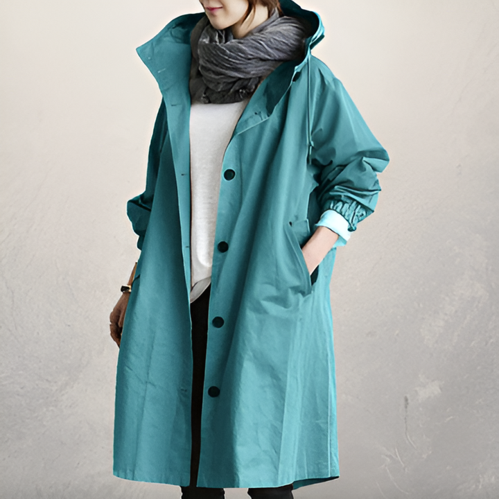 Back view of a women's polyester hooded loose fit trench coat, winter fashion essential.