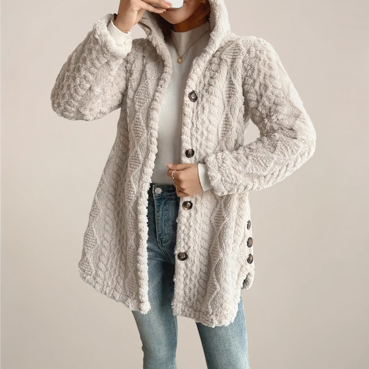 Casual wear women's hooded textured cardigan, a versatile spring fashion layering piece in soft knit.