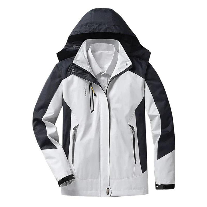 Women's hooded waterproof rain jacket in blue, perfect for winter fashion & outdoor activities.