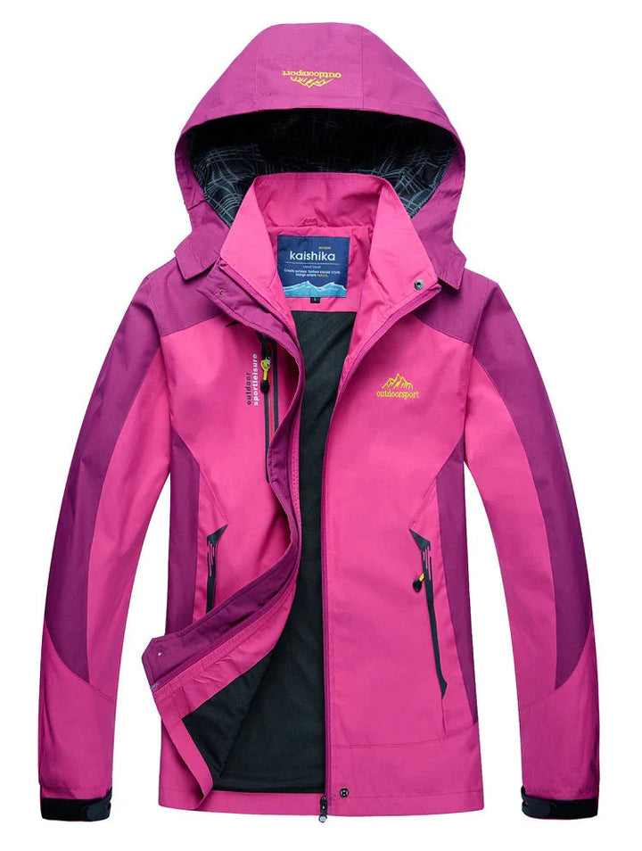 Front view of women's hooded waterproof rain jacket, showcasing weatherproof design.