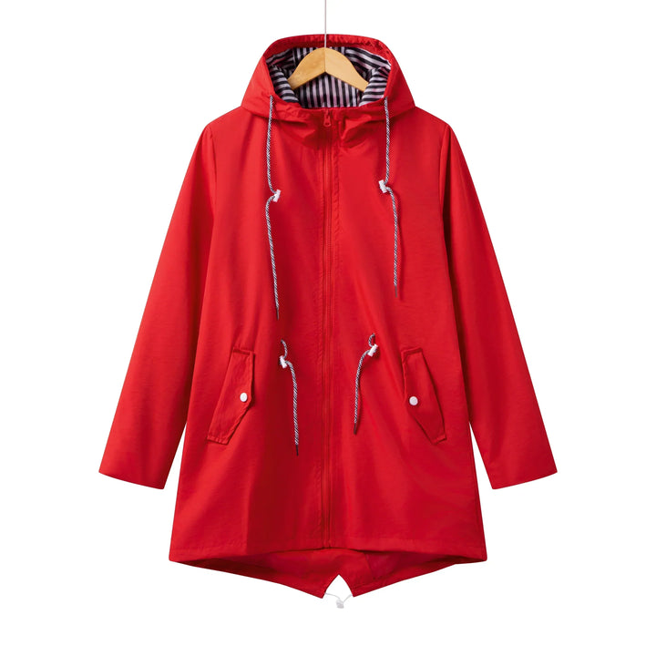 Folded women's zip-front hooded jacket in a vibrant color, ready for travel or cool weather casualwear