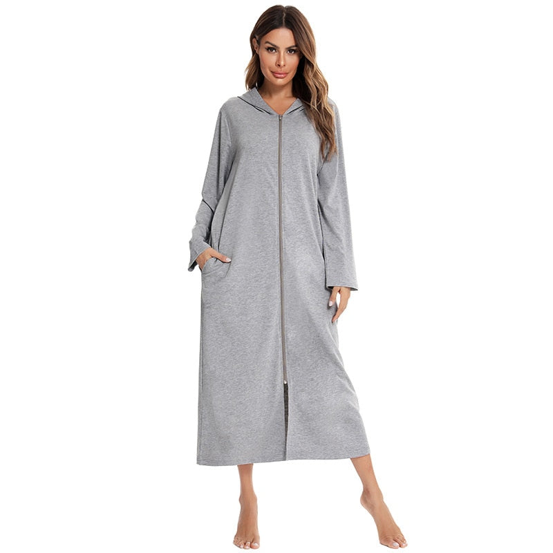 Warm women's fleece nightdress with full zip, hood, and practical pockets, ideal for winter