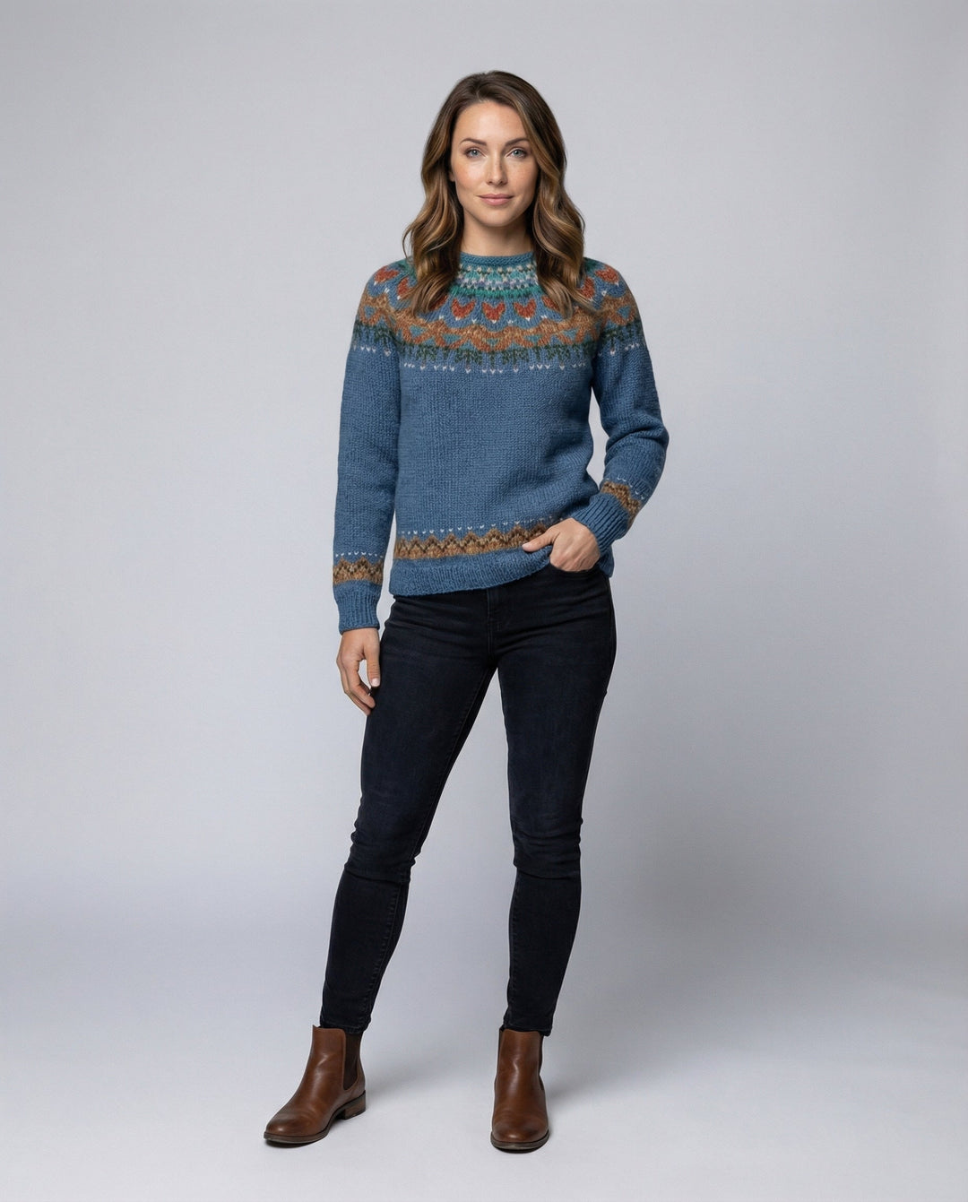 Detailed close-up of a women's vintage Icelandic knit sweater, showing cozy textured patterns & long sleeves.