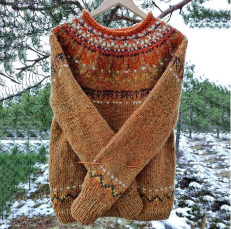 Full view of a women's Icelandic vintage knit sweater, featuring classic patterns & a cozy long-sleeve design.