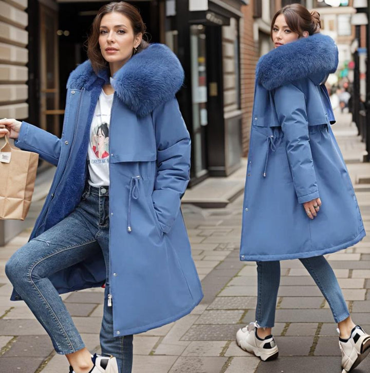 Women's insulated winter parka with plush hood, ideal for ultimate warmth & cold weather protection.