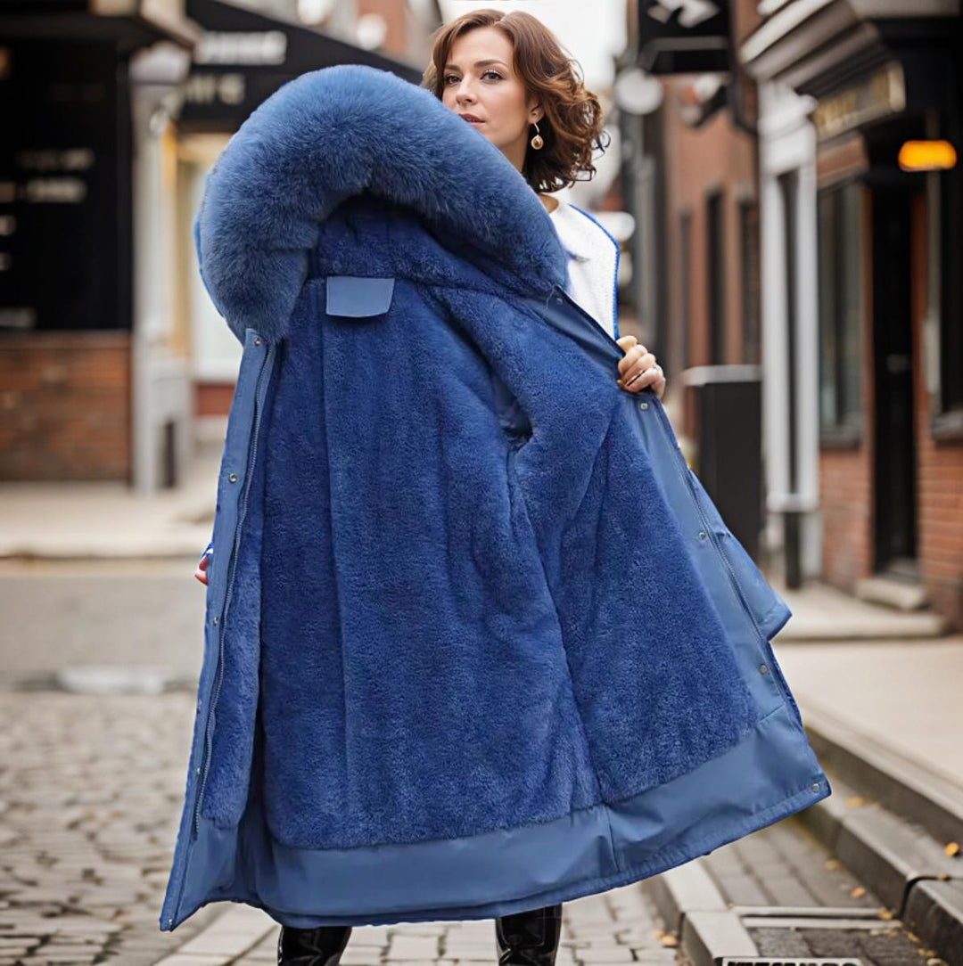Stylish women's long winter parka with a cozy plush hood. Insulated for superior warmth and waterproof protection.