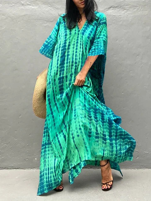 Women's Janne caftan maxi summer dress in bohemian print, perfect for vacation beachwear.