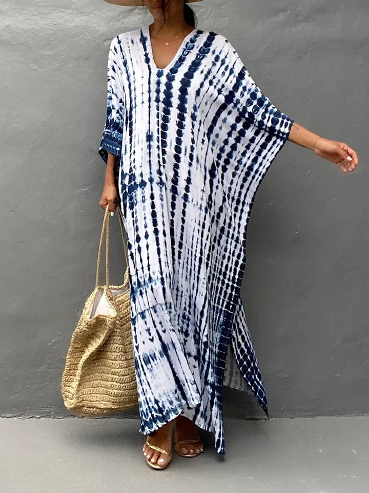 Janne caftan maxi dress with a vibrant print, ideal for women's summer vacation.