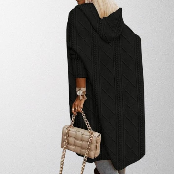 Close-up of a women's Johani hooded long sweater, showcasing knit texture
