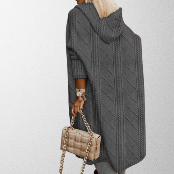 Full view of a woman wearing a Johani hooded long cardigan, chic fall fashion