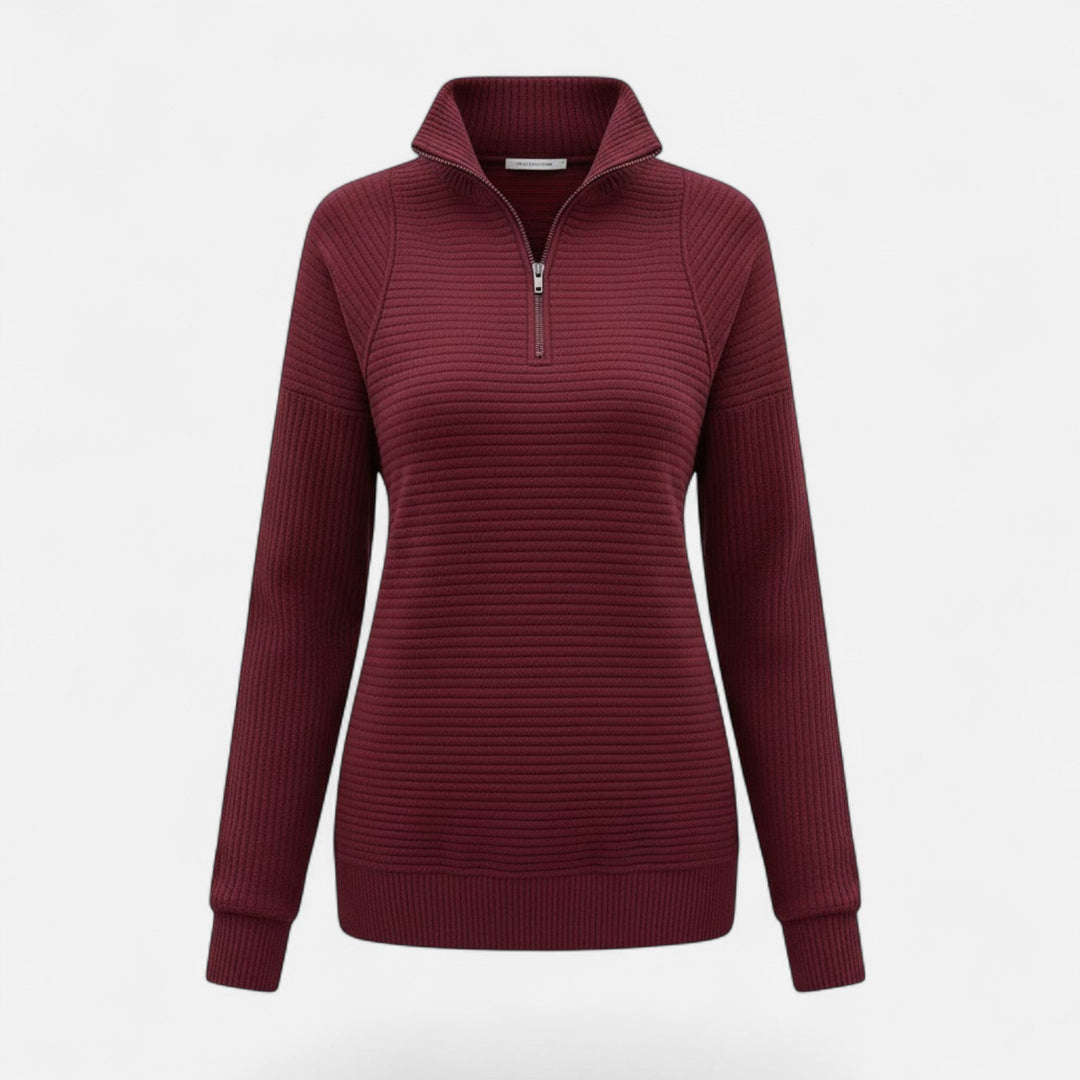 Chic women's knit sweater in a neutral tone, with a stand-collar and convenient zipper.