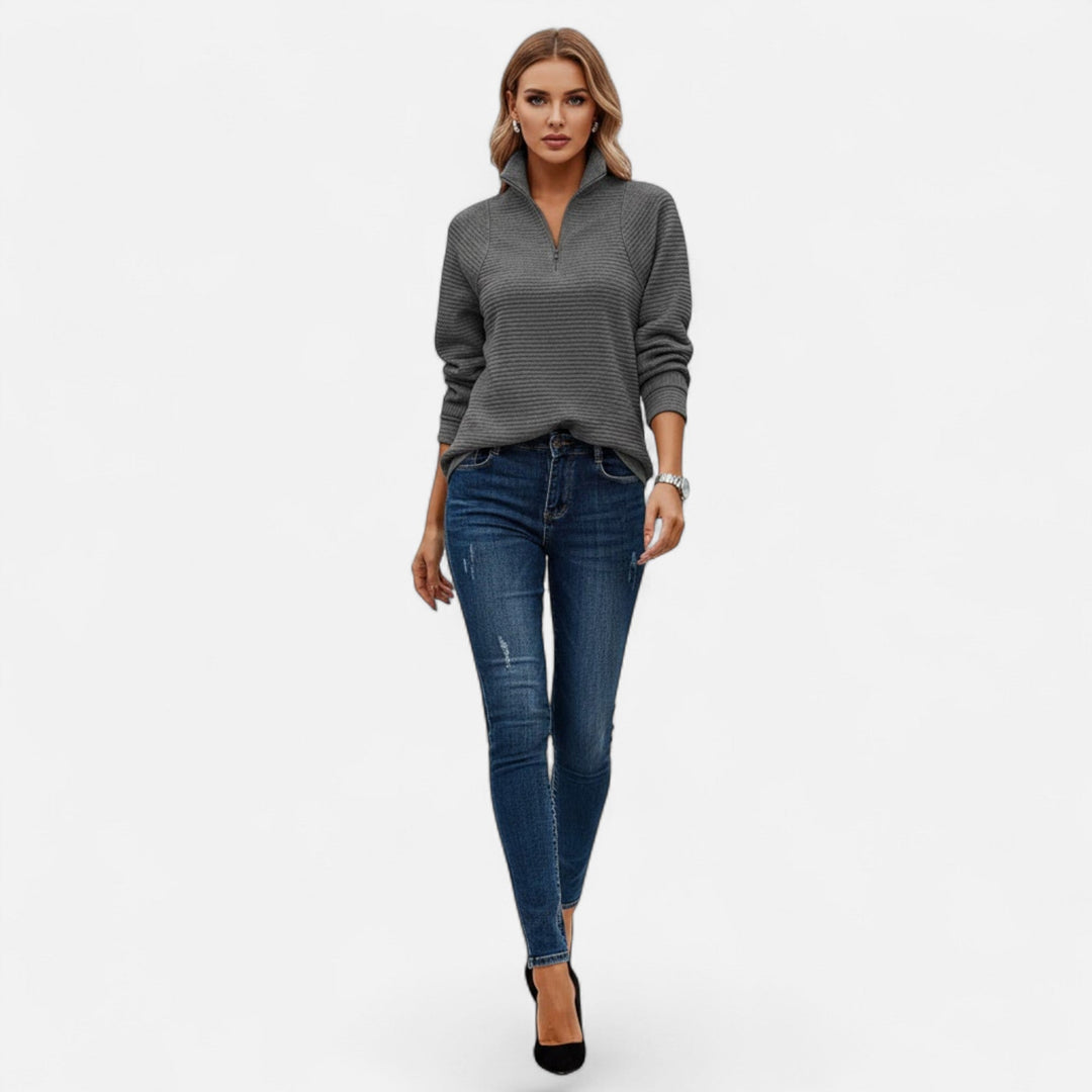 Elegant women's fall knit sweater with a modern zipper stand-collar for chic style.