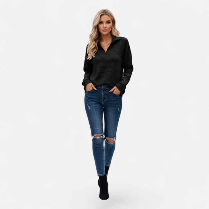 Women's fashion knit sweater, featuring a stand-collar and a front zipper for versatility.