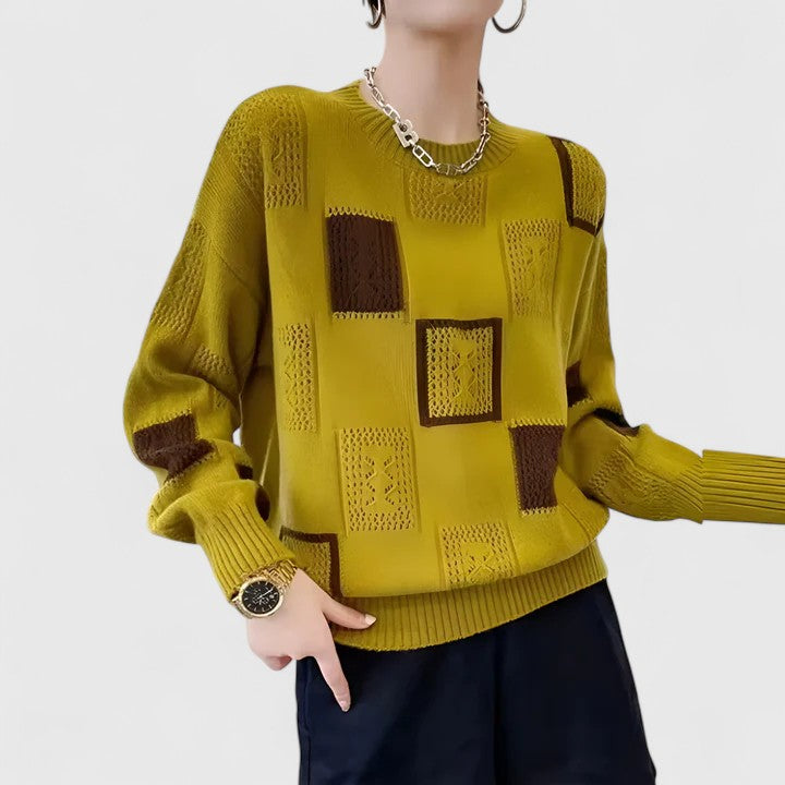 Stylish women's knitwear with delicate openwork pattern and classic round neck